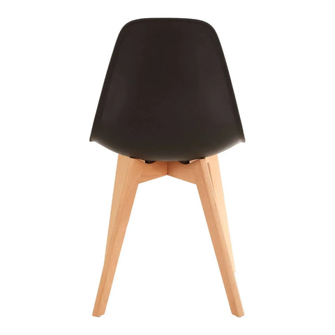 Black dining chair with curved plastic back and light wood legs rear view