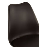 Black padded seat dining chair with a sleek, curved backrest and a modern design, showcasing a smooth surface and minimalistic style