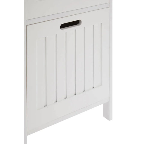 White wooden cabinet with slatted door and cutout handle, close-up angle