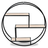 Three-tier round metal wall shelf featuring a circular black frame with three wooden shelves arranged in a modern, geometric design. The shelves are light-colored, providing a contrast to the dark frame