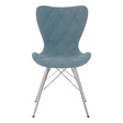 A Stockholm Blue Dining Chair featuring a curved, upholstered backrest in a soft blue fabric with a diamond pattern, supported by sleek, metallic legs. The chair has a modern design suitable for dining spaces
