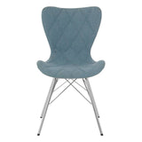 A Stockholm Blue Dining Chair featuring a curved, upholstered backrest in a soft blue fabric with a diamond pattern, supported by sleek, metallic legs. The chair has a modern design suitable for dining spaces