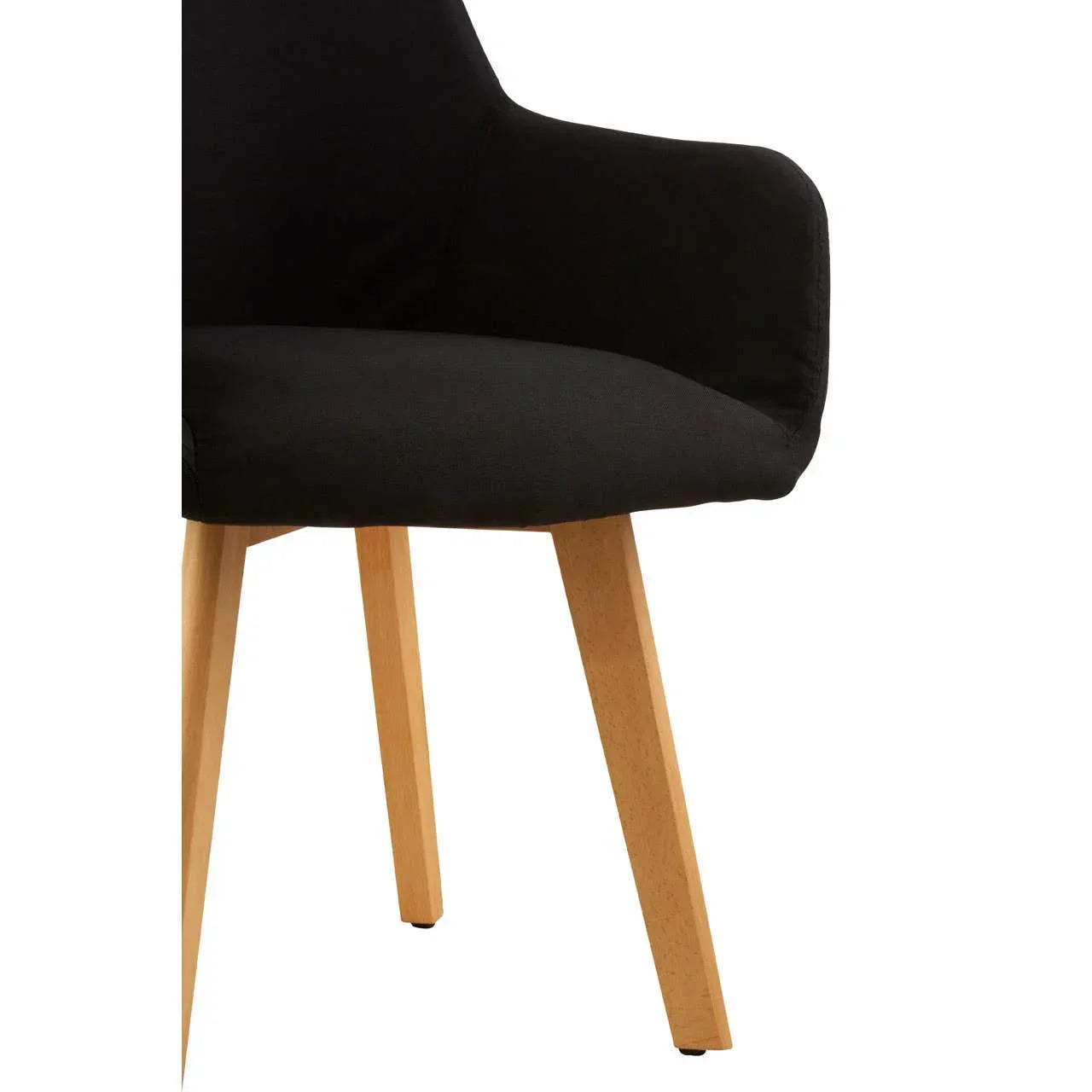 Black fabric dining chair with wooden legs and padded armrest, side close-up view
