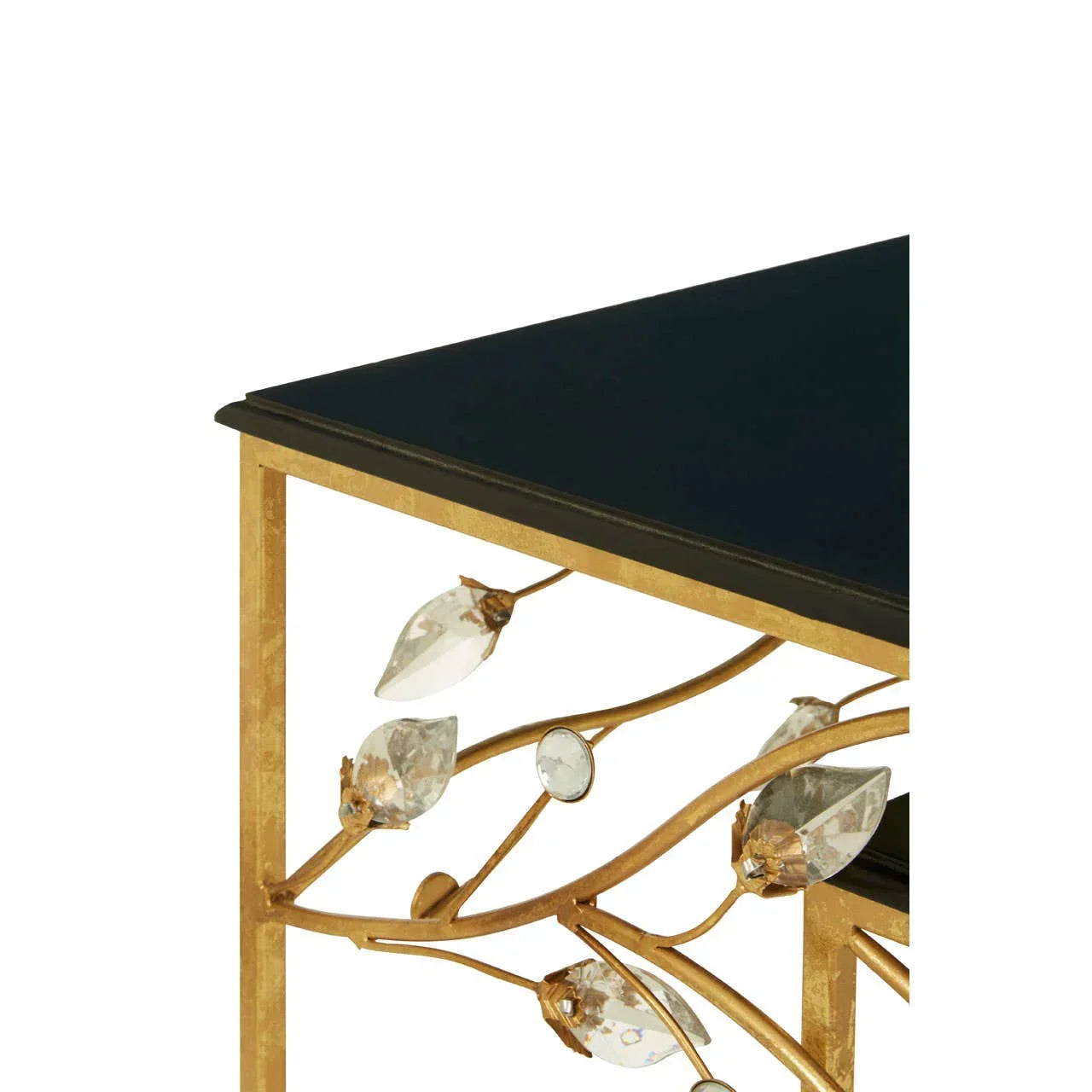 Gold metal console table corner with black glass top and crystal leaf detail