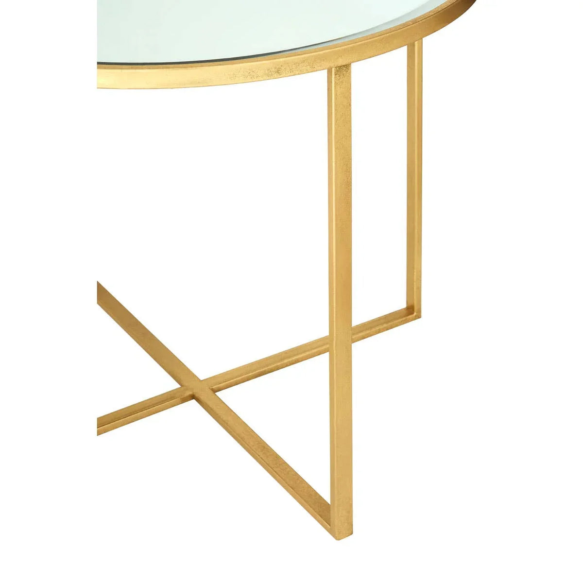Round glass coffee table with gold metal frame and crossed legs, close-up corner view