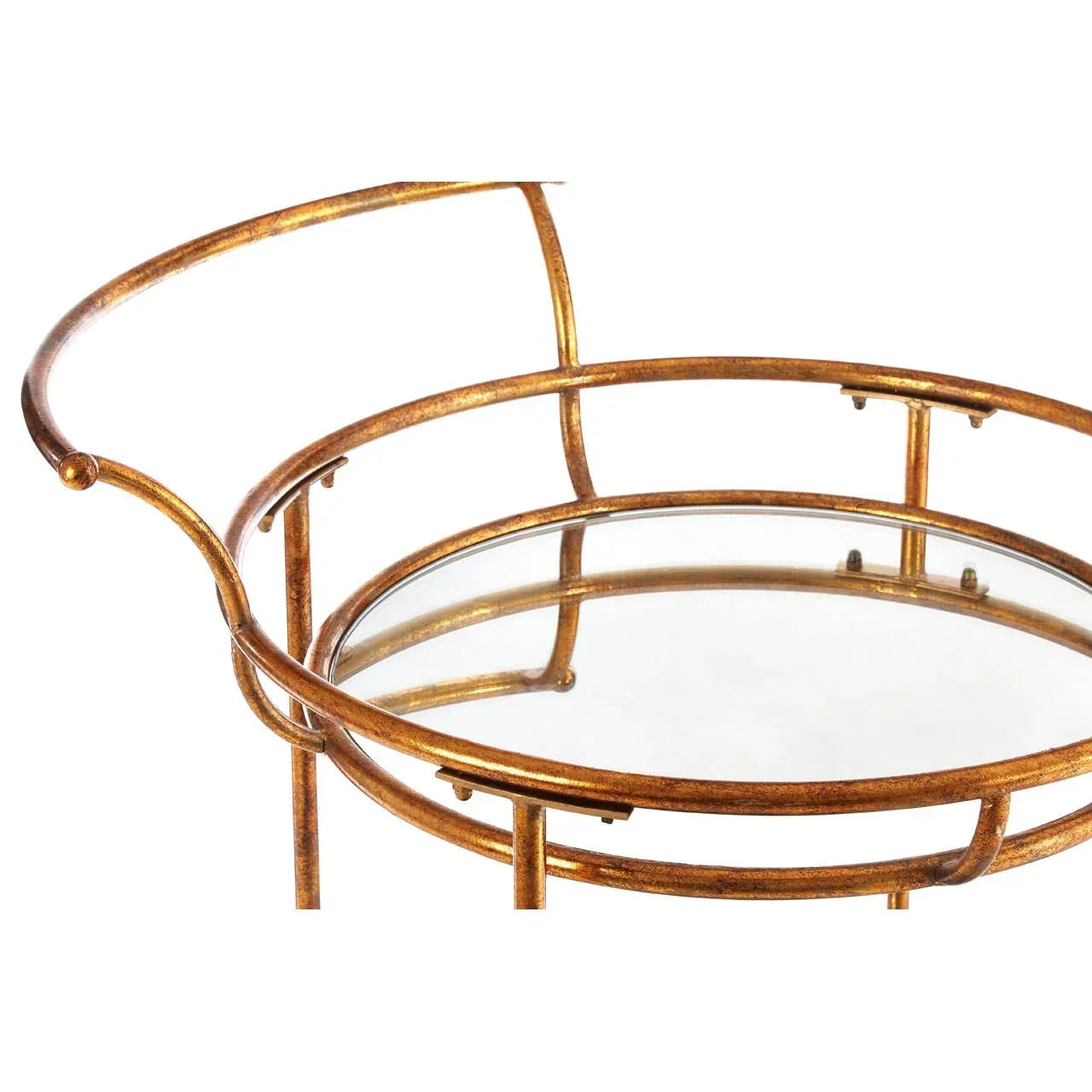 Round gold metal side table with mirrored glass top, close-up of frame and surface