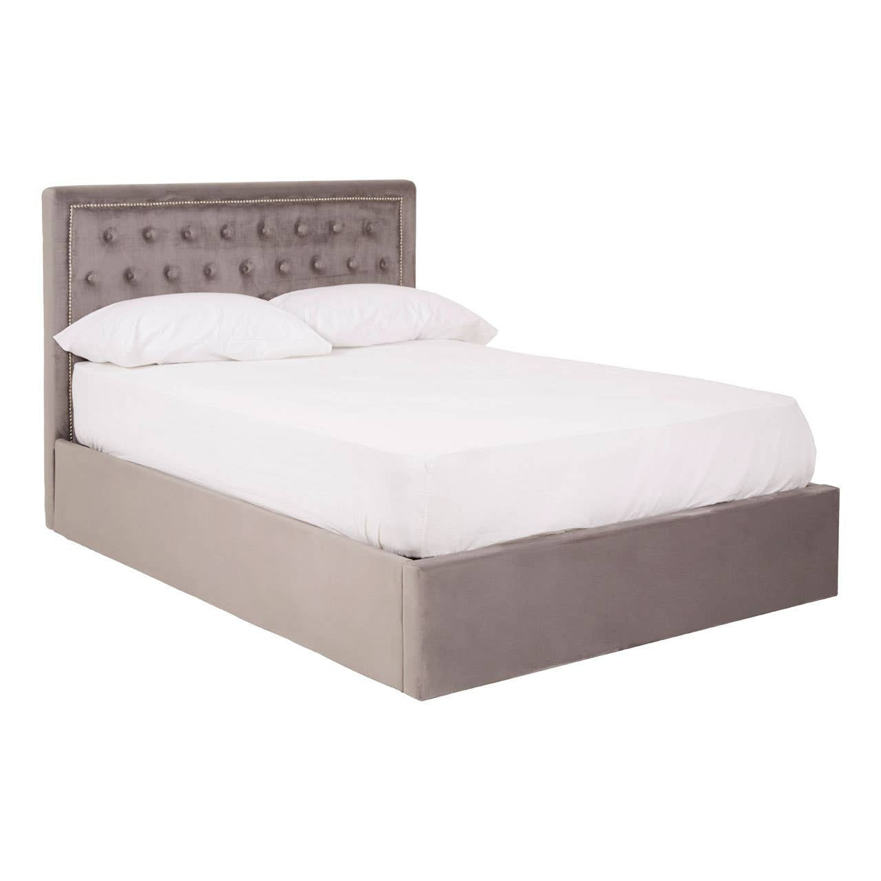 Double bed upholstered in grey velvet with a tufted headboard and a low-profile base, featuring a spacious storage compartment underneath. The bed is dressed with a white mattress and bedding