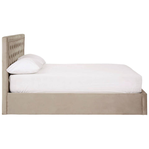 Mink velvet double bed with a padded headboard and a low-profile design, featuring a white mattress and a neutral-toned upholstered base