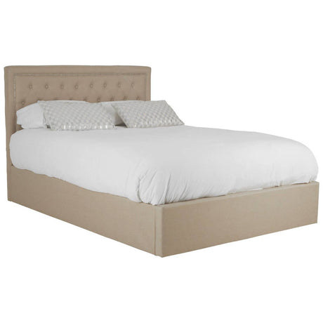 Beige upholstered double bed with a tufted headboard, featuring a white mattress and bedding, and a storage ottoman base