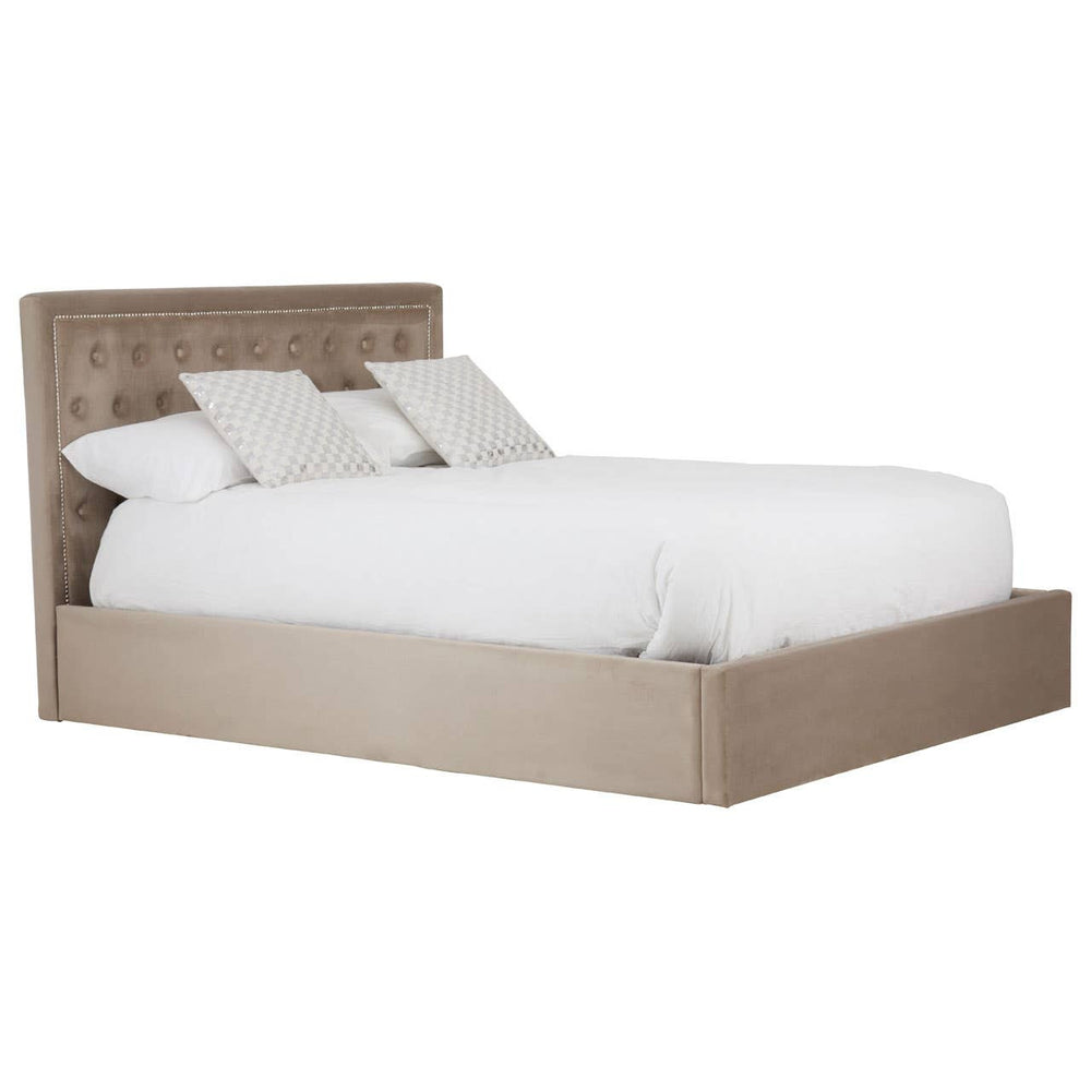 Mink velvet king bed with a tufted headboard, featuring a low-profile design and a spacious storage ottoman base, complemented by two white pillows and a white comforter