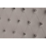 Grey upholstered headboard with deep button tufting and diamond stitch detail
