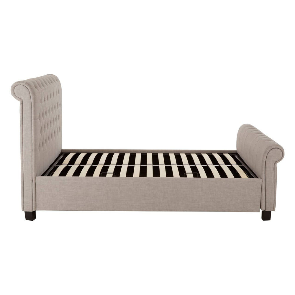Light grey ottoman double bed with a tufted headboard and side panels, featuring a slatted wooden base for mattress support. The bed has dark wooden legs and a sleek, modern design suitable for various bedroom styles