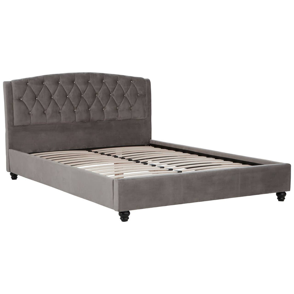 Grey velvet king bed with a tufted headboard and wooden legs, featuring a slatted base for mattress support