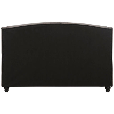 Grey velvet king bed with a curved headboard and tapered legs, showcasing a soft texture and elegant design