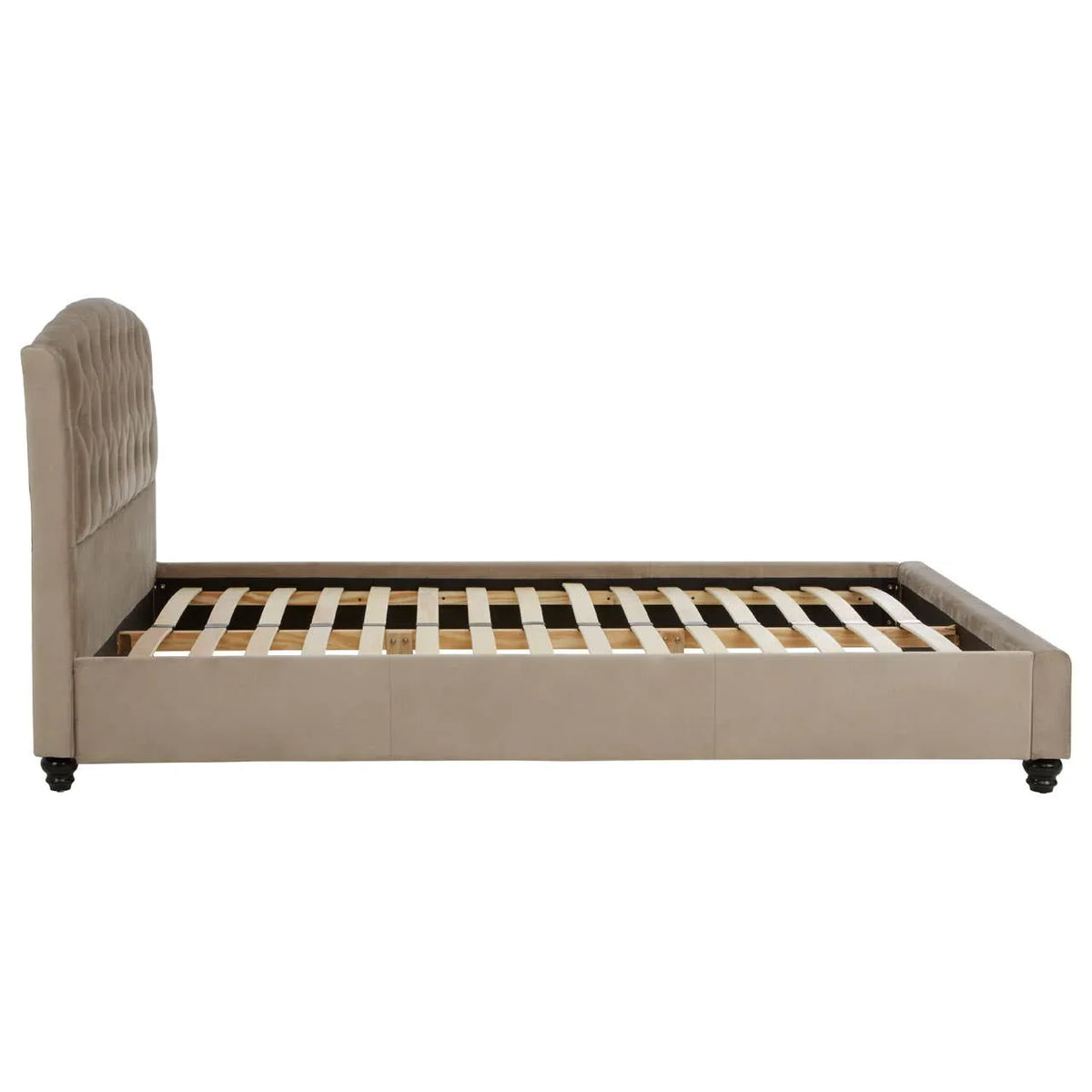 Beige upholstered bed frame with tufted headboard and wooden slats, side view