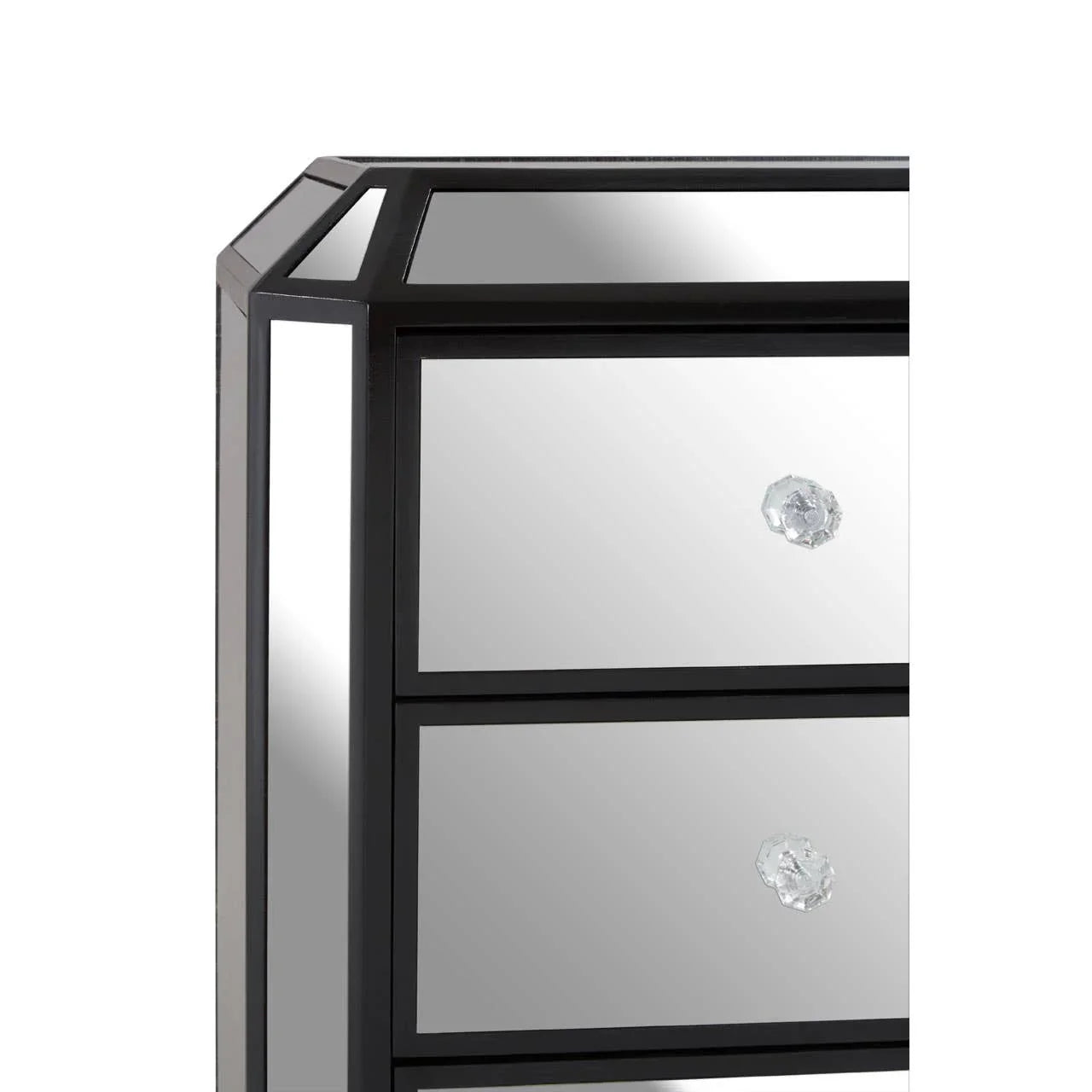 Corner view of mirrored chest of drawers with crystal handles and black trim