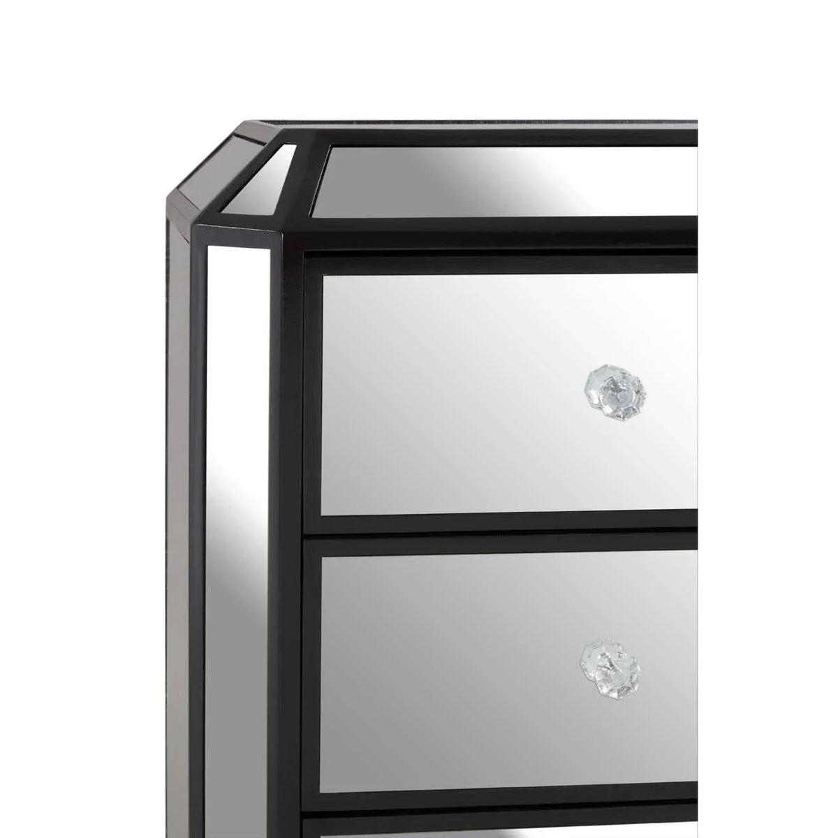 Corner view of mirrored chest of drawers with crystal handles and black trim