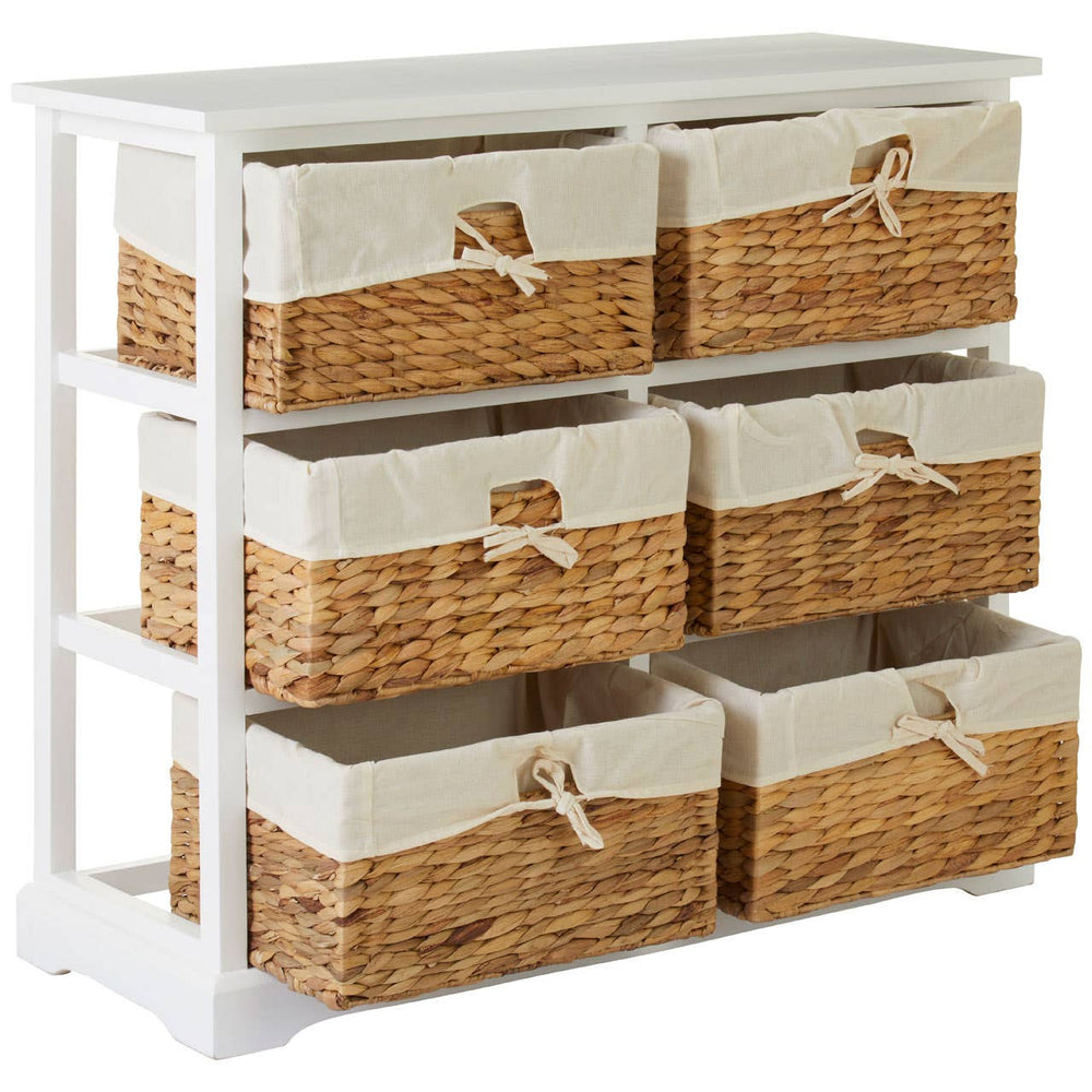 A white wooden chest featuring six seagrass drawers with fabric liners, arranged in two rows. The drawers have a natural woven texture and are designed with fabric handles for easy opening. The overall design is modern and functional, suitable for home organization