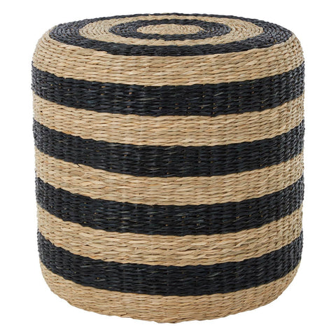 Round pouffe made of seagrass featuring alternating black and natural tan stripes, with a textured surface and a circular top