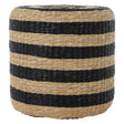 Round pouffe made of seagrass featuring alternating black and natural tan stripes, designed for versatile home decor use