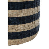 Seagrass pouffe featuring a woven design with alternating black and natural tan stripes, showcasing a rounded shape and textured surface