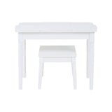 A white children's dressing table with a smooth, rounded top and four straight legs, accompanied by a matching white stool with a cushioned seat. The design is simple and modern, suitable for a child's room