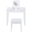White children's dressing table with a heart-shaped mirror and two small drawers, accompanied by a matching white stool. The furniture features clean lines and a simple design, suitable for a child's room