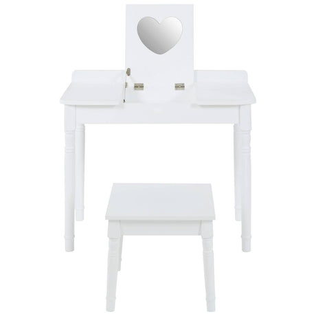 White children's dressing table with a heart-shaped mirror and two small drawers, accompanied by a matching white stool. The furniture features clean lines and a simple design, suitable for a child's room