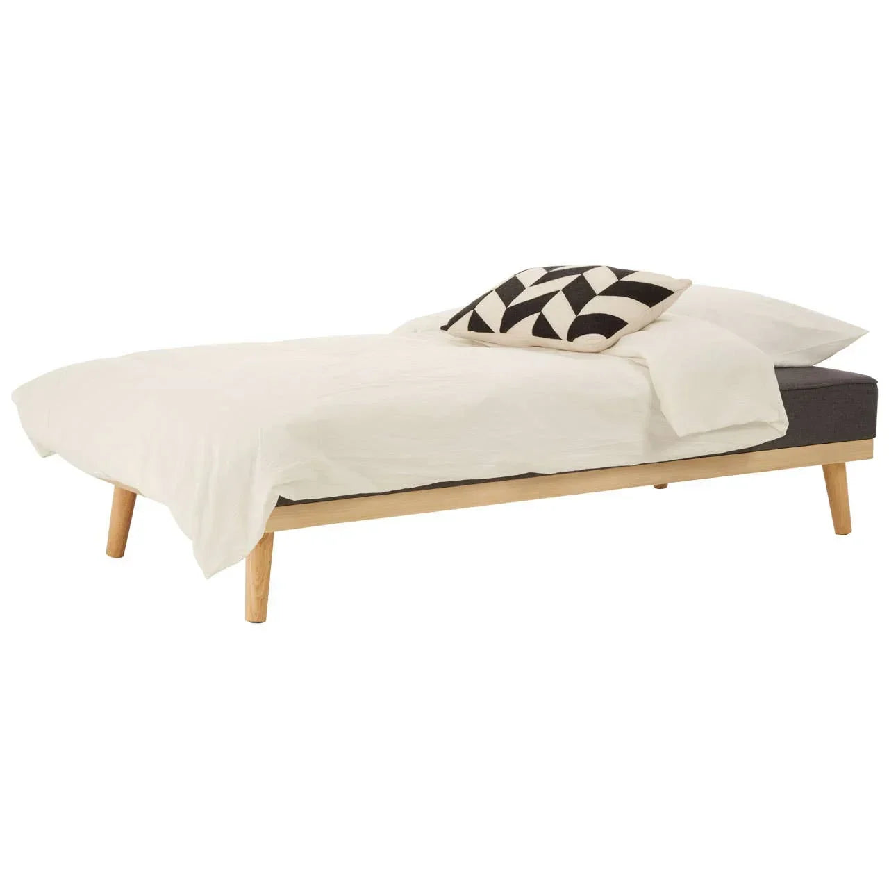 Modern single bed frame with natural wood legs, white bedding, and geometric cushion