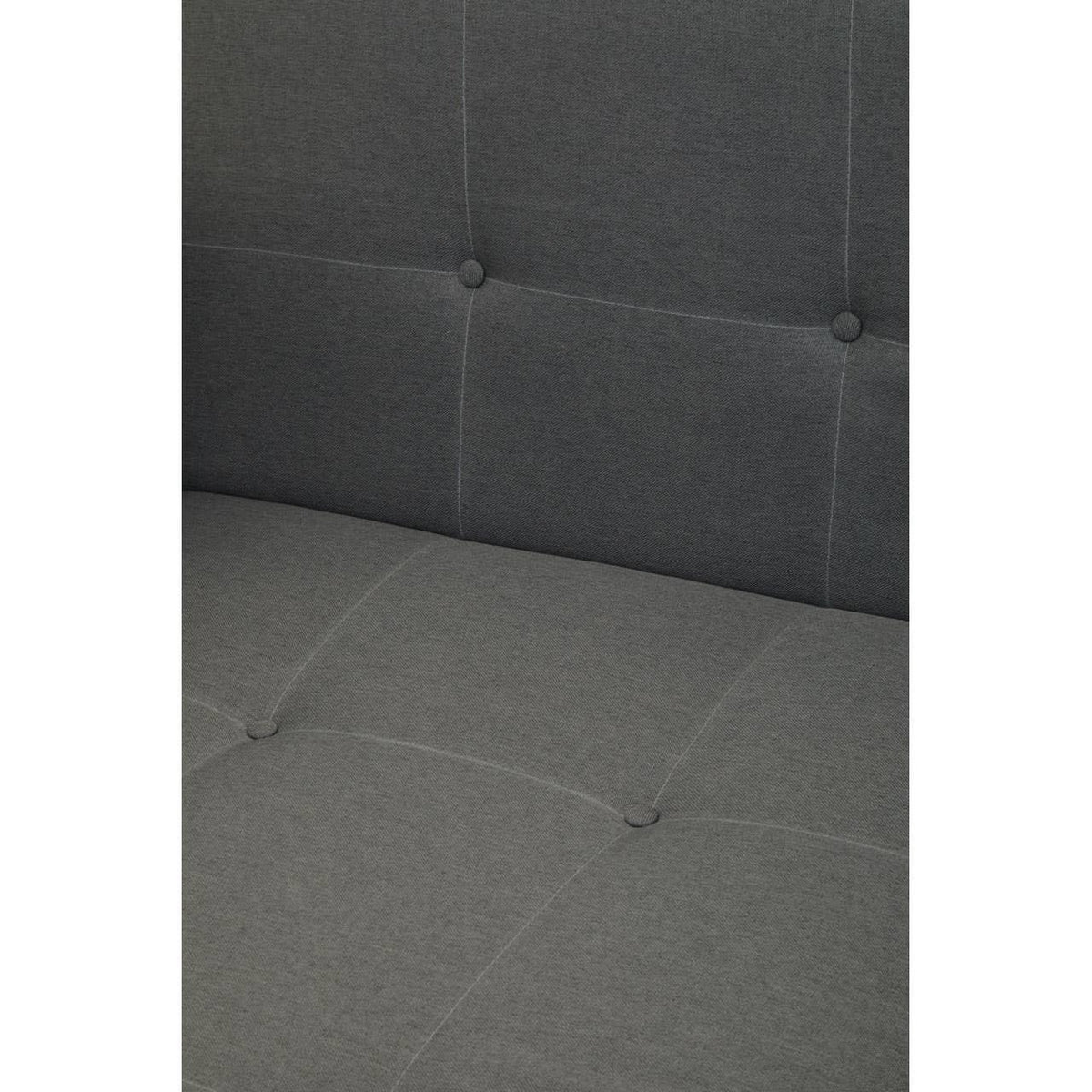 Closeup of grey fabric sofa seat and back with button-tufted detail and contrast stitching