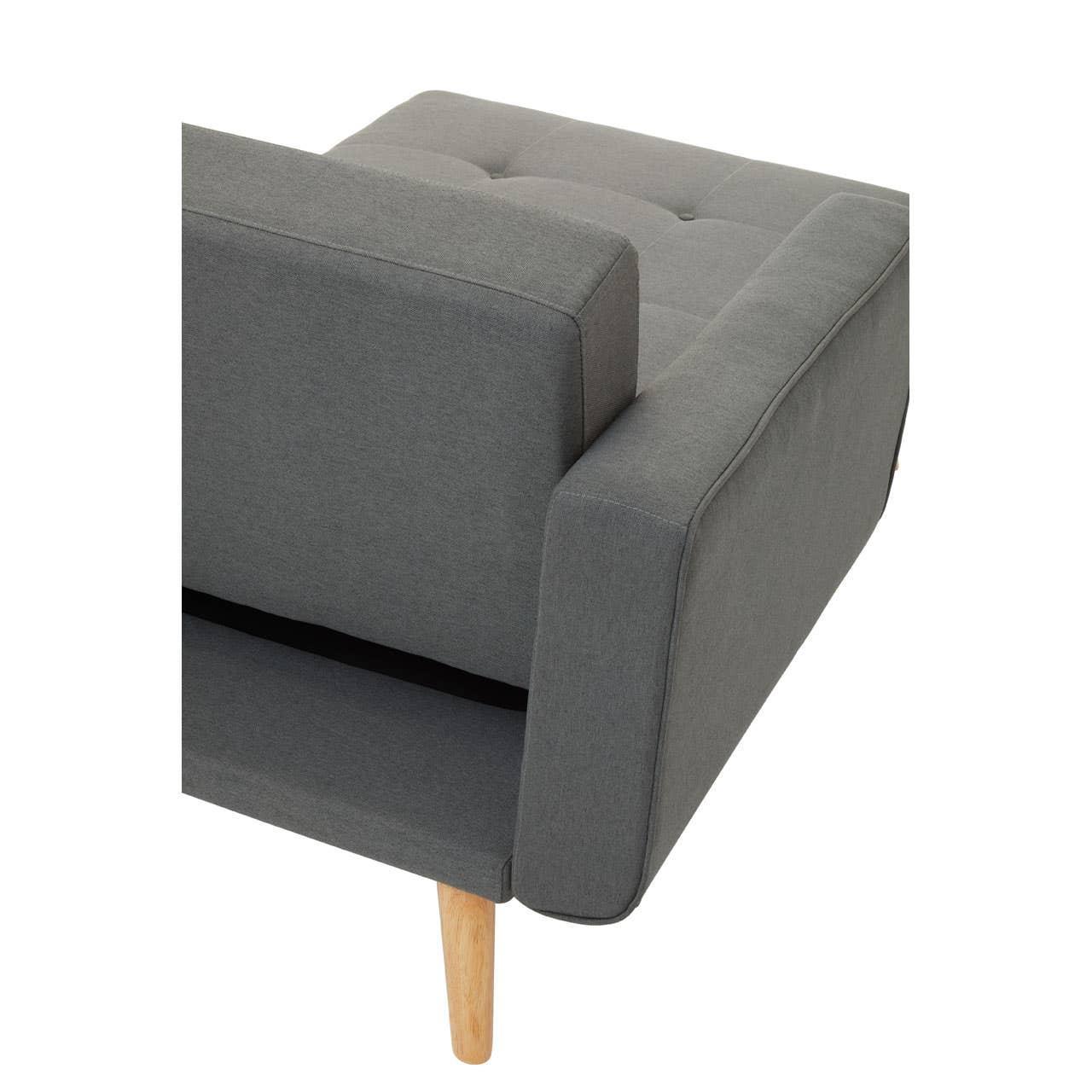 Grey fabric sofa arm and tufted seat cushion with light wood leg, rear angle view