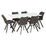 A rectangular dining table with a white marble effect top, surrounded by six modern chairs with dark gray upholstery and black legs, arranged in a spacious layout