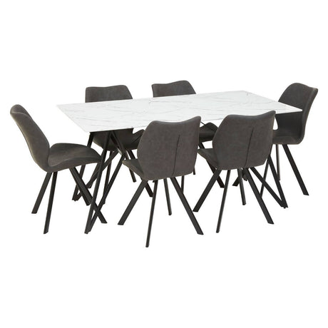 A rectangular dining table with a white marble effect top, surrounded by six modern chairs with dark gray upholstery and black legs, arranged in a spacious layout