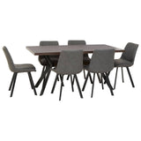 Rectangle dining table with a smooth wooden surface and six matching chairs. The chairs feature a modern design with gray upholstery and black legs, arranged around the table. The overall aesthetic is contemporary and stylish, suitable for dining areas