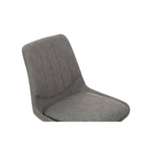 A modern gray dining chair with a curved backrest and a smooth seat, designed for comfort and style, suitable for pairing with a dining table