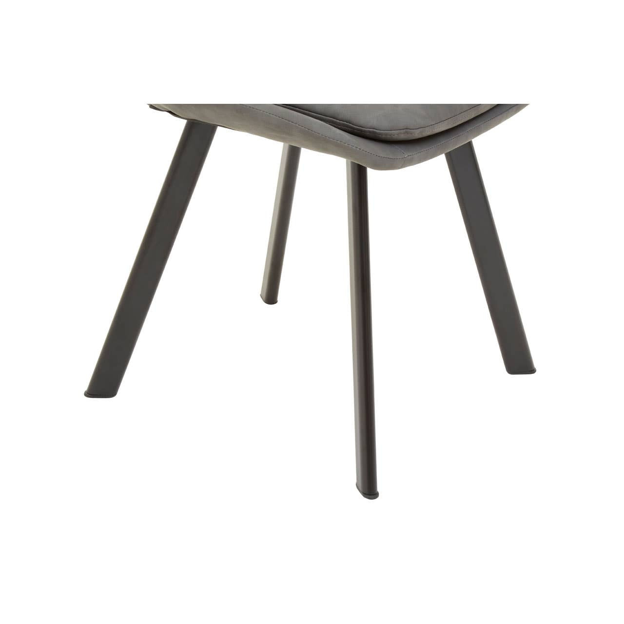 Westford rectangle dining table with a smooth surface and tapered legs, accompanied by six matching chairs featuring cushioned seats and a modern design. The set showcases a contemporary aesthetic suitable for dining spaces