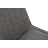 Close-up view of a gray upholstered dining chair featuring vertical stitching on the backrest, showcasing a modern design suitable for a dining table set