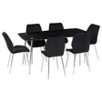 Black tempered glass dining table accompanied by six matching black upholstered chairs with sleek metal legs, arranged around the table in a modern setting