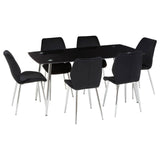 Black tempered glass dining table accompanied by six matching black upholstered chairs with sleek metal legs, arranged around the table in a modern setting