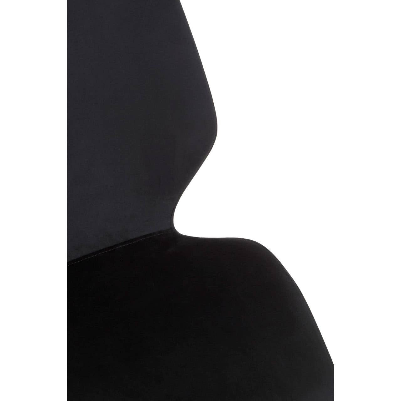 Close-up view of a black chair with a uniquely shaped backrest, showcasing a smooth surface and modern design, set against a white background