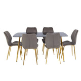 Smoked glass dining table with six upholstered chairs featuring a modern design, each chair supported by wooden legs. The table has a sleek, rectangular shape, while the chairs have a curved backrest and a neutral gray fabric
