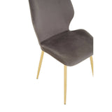Smoked glass dining table with a sleek, modern design accompanied by six upholstered chairs featuring a curved back and gold metal legs. The chairs are upholstered in a soft, dark gray fabric, adding a touch of elegance to the set