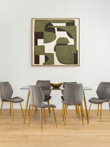 Smoked glass dining table surrounded by six modern gray chairs with wooden legs, set against a light-colored wall featuring an abstract artwork in earthy tones. The floor is a warm wooden finish, creating a cozy dining atmosphere