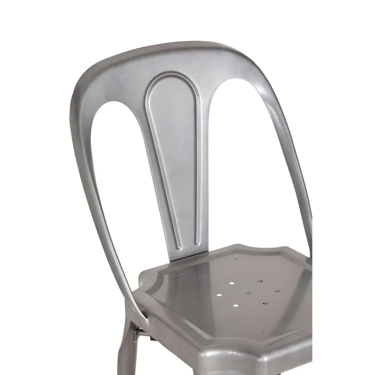 Brushed metal dining chair with curved backrest and perforated seat, partial side view