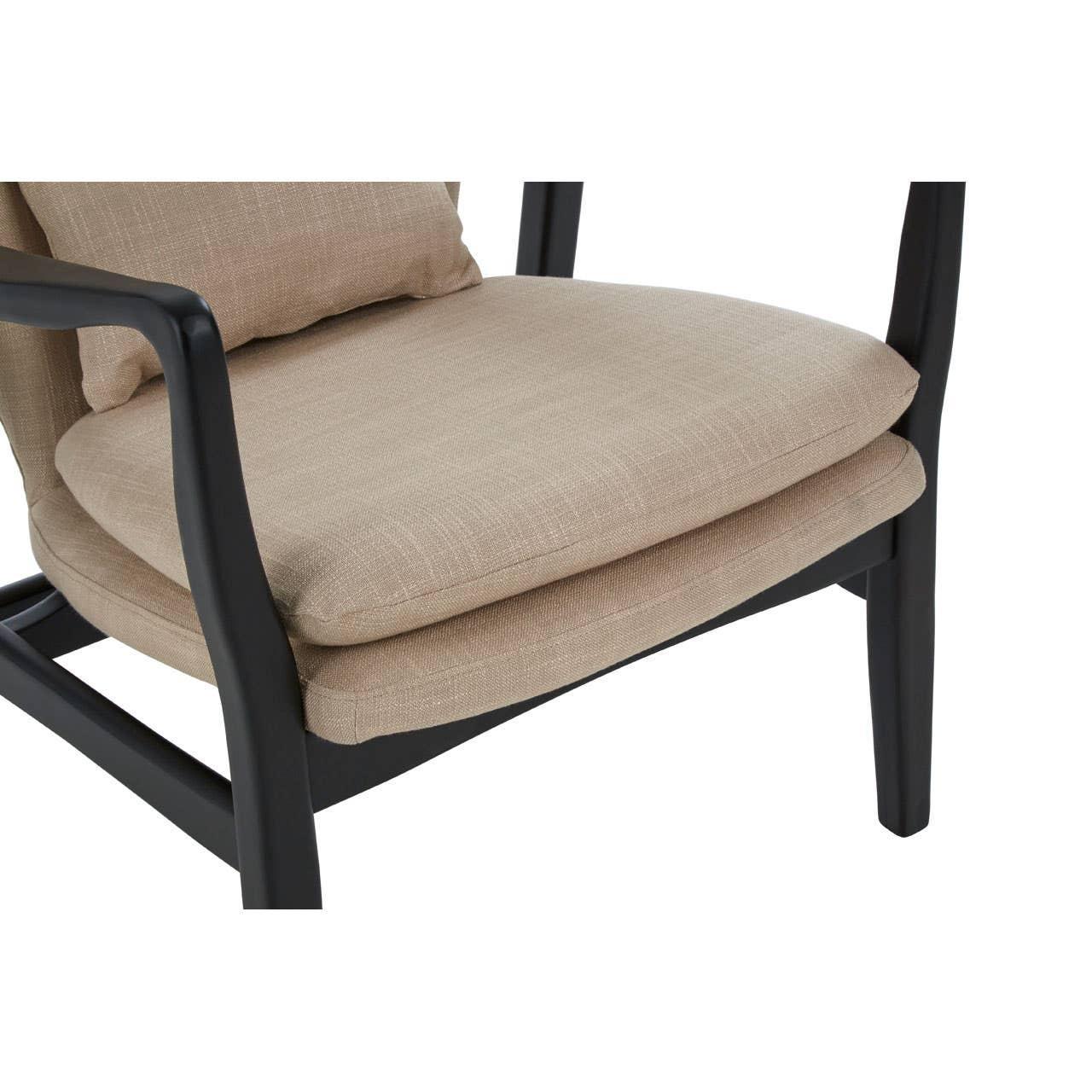 Beige fabric cushioned dining chair with black wooden armrest and frame, side angle view