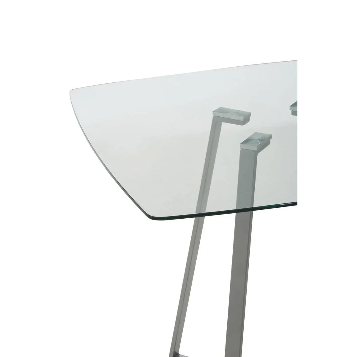 Clear glass dining table with metal legs and curved edge, close-up view