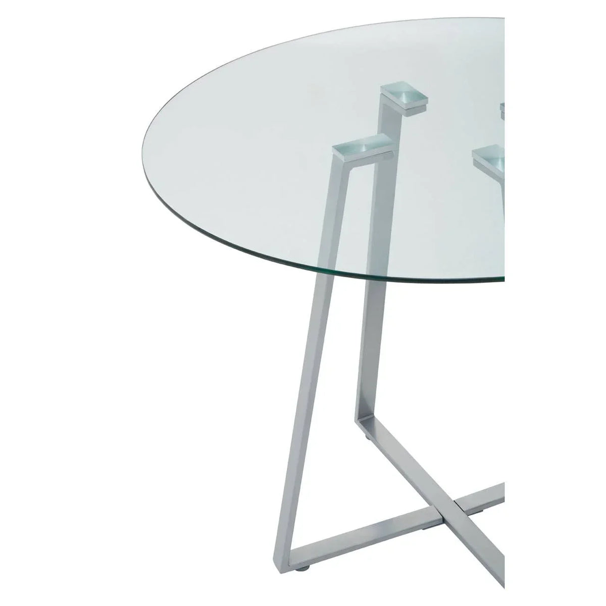 Round glass dining table with metal legs, close-up view of top and modern frame