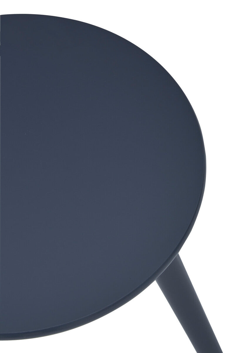 Round dark grey side table with a smooth surface and slender, angled legs. The design is modern and minimalistic, suitable for various home decor styles