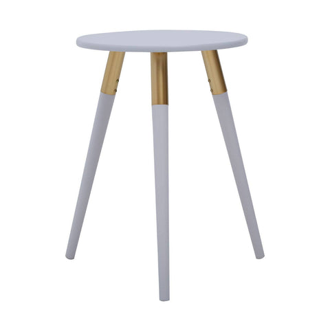 Light grey round side table with three tapered legs, two of which are light grey and one is natural wood, creating a modern and minimalist design suitable for various home decor styles