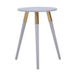 Light grey round side table with three tapered legs, two of which are light grey and one is natural wood, creating a modern and minimalist design suitable for various home decor styles